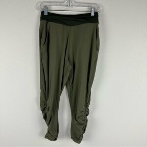 Lululemon Fatigue Gator Green Snakeprint Sunset Salutation Crop Leggings Size 6